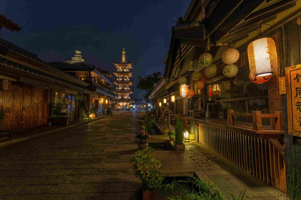 Stunning view of Kyoto, Japan, featuring a traditional Japanese temple, vibrant autumn foliage, and serene gardens—top cultural travel destination for history, nature, and sightseeing in 2025